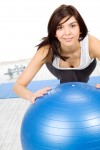 Woman on Exercise Ball doing Rehab