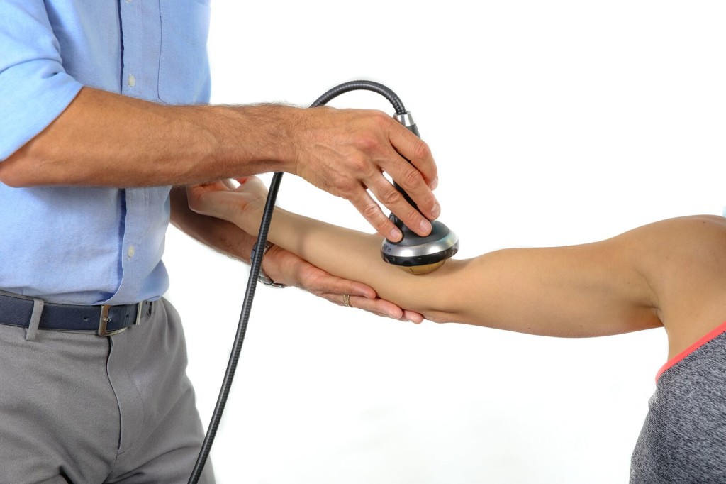 Piezowave- ESWT being used to treat medial epicondylitis (tennis elbow)